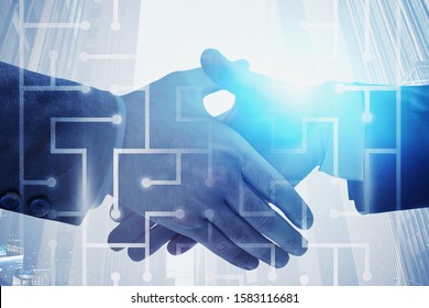 Two Unrecognizable Businessmen Shaking Hands In Night City With Double Exposure Of Digital Maze. Concept Of Partnership And Technology. Toned Image