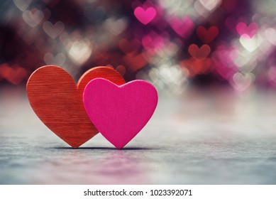 Two Valentines Hearts Over Holiday Abstract Background.