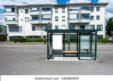 Two Vertical Blank White Billboard At Bus Stop On City Street. In The Background Buildings And Road. Mock Up. Poster In Sunny Summer Day.