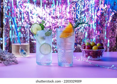 Two Vibrant And Sparkling Alcoholic Punch Is Perfect For Christmas Party. Colorful Cocktails In Glasses.  Fresh Holiday Drinks. 