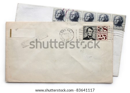 Two vintage airmail envelopes with Abraham Lincoln and George Washington postage stamps from USA.