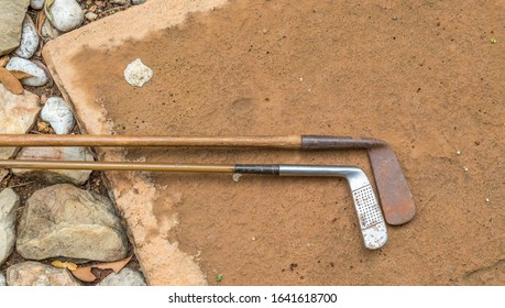 Two Vintage Golf Clubs With Hickory Shafts Isolated