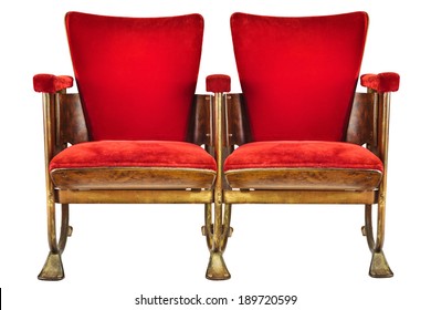 Two Vintage Red Movie Theater Chairs Isolated On A White Background