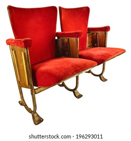 Two Vintage Red Movie Theater Chairs Isolated On A White Background