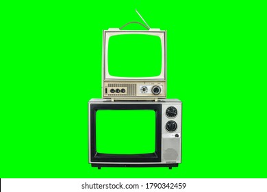 Two vintage televisions isolated with cut out green screen and background.