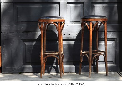 Two Vintage Wooden Bar Stools In The Pub