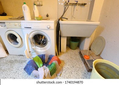 Two Washing Machines For Washing Clothes In The Laundry Room Of The Student House And A Large Ceramic Sink