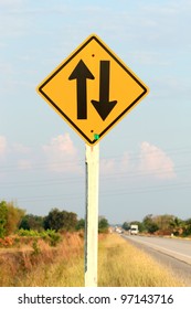 Two Way Arrow Traffic Sign, Road Background