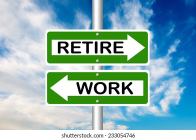 Two Way Street Road Sign Pointing To Work And Retire With A Blue Sky In A Background