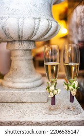 Two Wedding Champagne Glasses On A Stone.