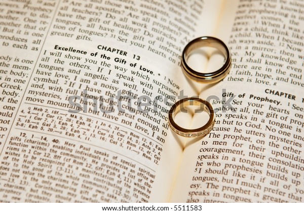 Two Wedding Rings On Bible Open Stock Photo Edit Now 5511583