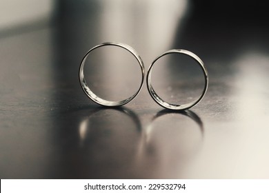 Two Wedding Rings On Table