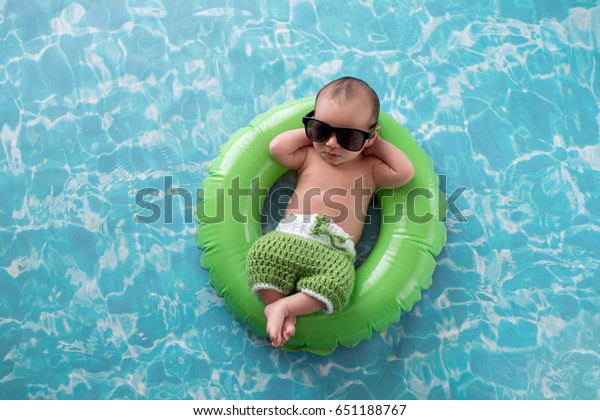 two-week-old-newborn-baby-600w-651188767.jpg