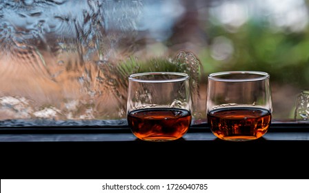 Two Whisky In A Glass And Blurred Background.