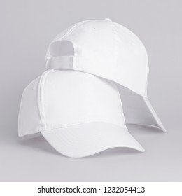 Two White Baseball Caps Isolated On Stock Photo 1214701231 | Shutterstock