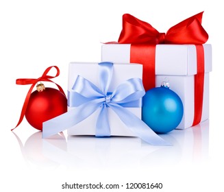 Two White boxs tied with a satin ribbon bow, red and blue Christmas balls Isolated on white background