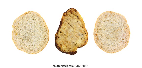 Two White Buns With A Heated Grilled Chicken Breast In The Middle For A Sandwich Isolated On A White Background.