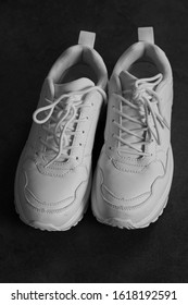 Two White Chunky Sneakers. Tied Shoelaces