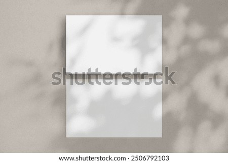Two white horizontal paper sheets mockup, US Legal flyer mockup, paper, letter, invitation card. on a beige background with a shadow overlay.