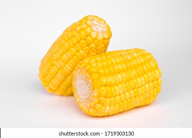 two white isolated sweet corns