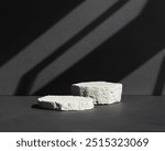 Two white stone podium against Minimal shadow composition on Black background for product presentation