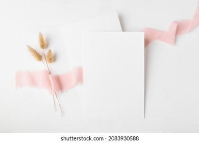 Two White Wedding Invitation Card Mockup On White Table 5x7 Ratio