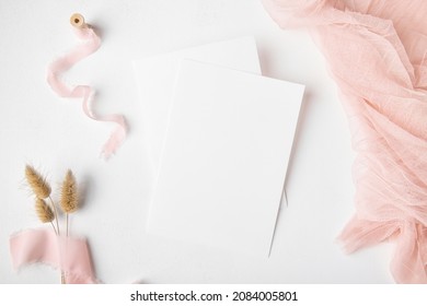 Two White Wedding Invitation Card Mockup On White Table 5x7 Ratio