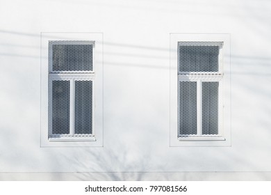 two white window, wall