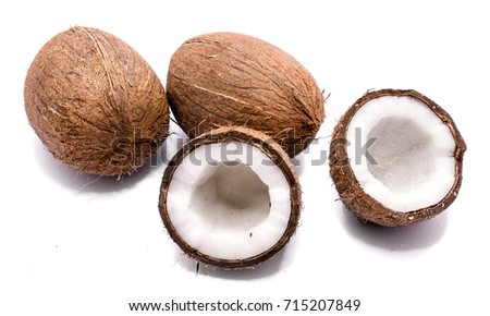 Image, Stock Photo Two whole coconuts on light background with tropical leaves and flowers, top view, frame. Copy space for your design: product or text. Vegan lifestyle concept. Coconut benefits