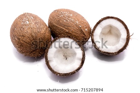 Similar – Image, Stock Photo Two whole coconuts on light background with tropical leaves and flowers, top view, frame. Copy space for your design: product or text. Vegan lifestyle concept. Coconut benefits