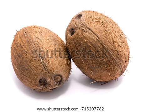 Similar – Image, Stock Photo Two whole coconuts on light background with tropical leaves and flowers, top view, frame. Copy space for your design: product or text. Vegan lifestyle concept. Coconut benefits