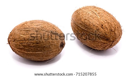 Similar – Image, Stock Photo Two whole coconuts on light background with tropical leaves and flowers, top view, frame. Copy space for your design: product or text. Vegan lifestyle concept. Coconut benefits