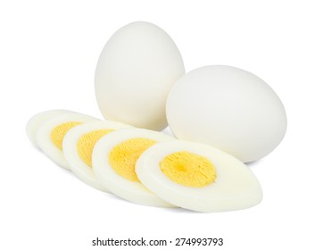 Two whole eggs in the shell and one chopped boiled egg isolated on white background. - Shutterstock ID 274993793