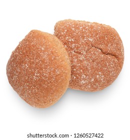 Two whole wheat breadcake baps isolated on white background from above