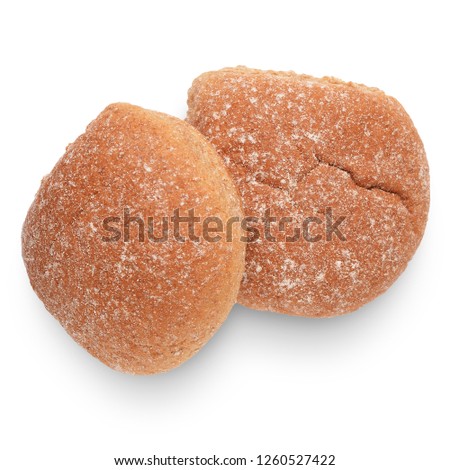 Two whole wheat breadcake baps isolated on white background from above