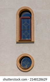 Two Windows With Cross Symbols At New Church Building