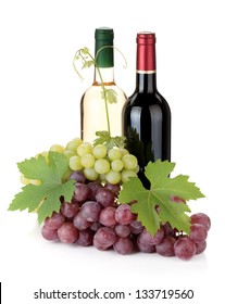 Two Wine Bottles And Grapes. Isolated On White Background