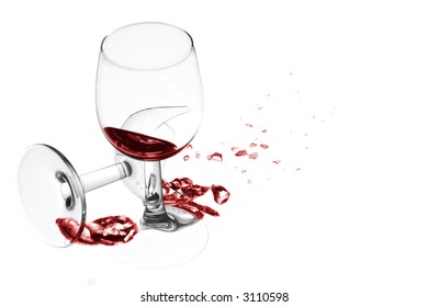 Two Wine Glasses Tipping Over And Breaking On White Background. High Key Image.