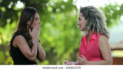 Two Women Chatting Outside, People Talking At Park