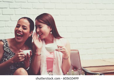 Two women in coffee shop