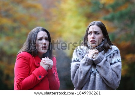 Image, Stock Photo happy twin sisters stand on a bridge and look up