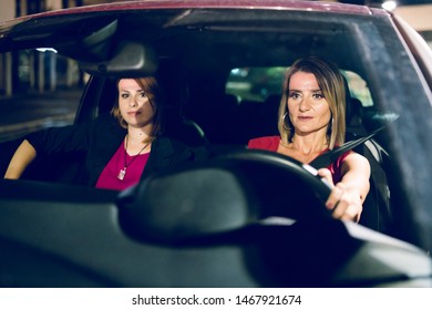 Two Women Females In The Car Driving At Night Friends Mother And Daughter Sisters Travel Journey Road Trip