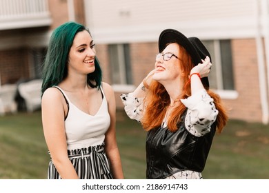 Two Women Hanging Out Outside