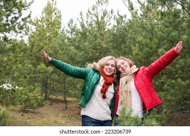    Two Women Laughing Outdoors
