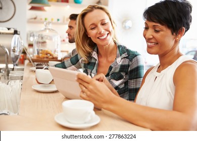 Two Women At A Meeting In A Cafe