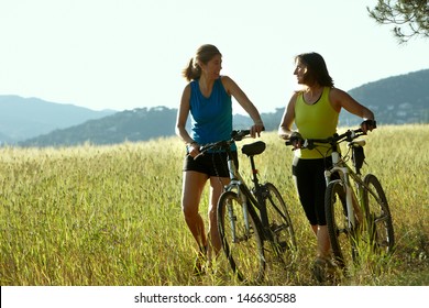 Two Women On A Bike Ride