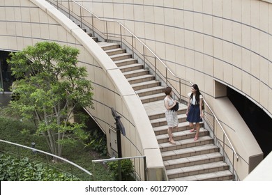 Two Women On Steps In Namba Park Office And Shopping Complex