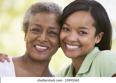 Two women outdoors smiling