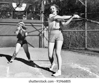 Two Women Playing Baseball