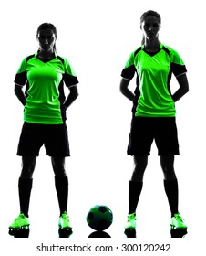 Two Women Playing Soccer Players In Silhouette Isolated On White Background